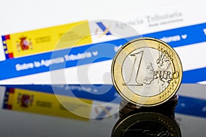 Income Tax Campaign Spain. Euro Coin IRPF web Background. Declaracion de la Renta Macro photo