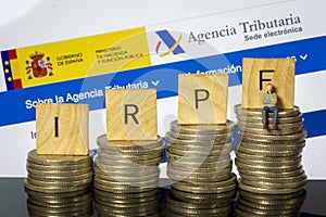 Income Tax Campaign Spain. Euro Coin IRPF web Background. Declaracion de la Renta Macro photo