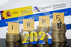 Income Tax Campaign Spain 2021. Euro Coin IRPF web Background. Declaracion de la Renta Macro photo