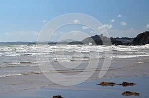 Incoming tide at blackrock Sands, Wales.