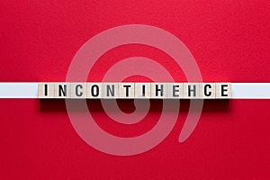 Incontihence word concept on cubes photo