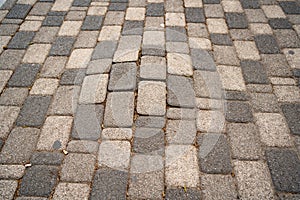 Incorrectly laid paving slabs. bumps in road