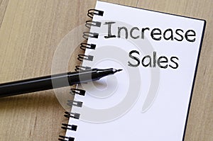 Increase sales write on notebook