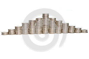 Increasing and decreasing piles of coins photo