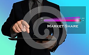 Increasing market share. Businessman in a suit with a market share indicator.