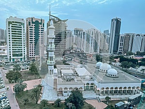 Incredible aerial view of Abu Dhabi city skyline and famous towers | Corniche skyscrapers | UAE