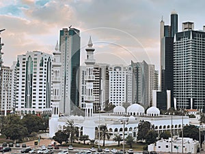 Incredible aerial view of Abu Dhabi city skyline and famous towers | Corniche skyscrapers | UAE