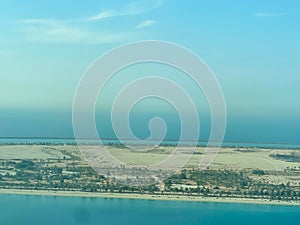 Incredible aerial view of Abu Dhabi Corniche road and beach