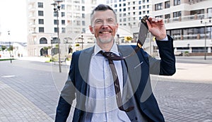 Incredible joy of businessman. Happy manager beside office window. Think about the jackpot photo
