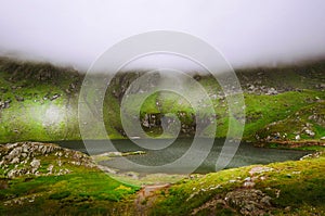 Incredible landscape with foggy mountains