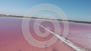 Incredible nature of Ukraine. Salty pink estuary Kuyalnik. Aerial view of coastline of littoral zone on Kuyalnik Liman, Odessa Obl