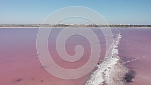 Incredible pink salty sands of Kuyalnik estuary, Odessa, Ukraine. Black Sea Kuyalnik estuary. Drying estuary, water colored with a