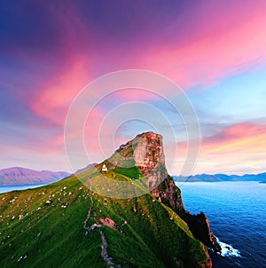 Incredible sunset landscape with Kallur lighthouse