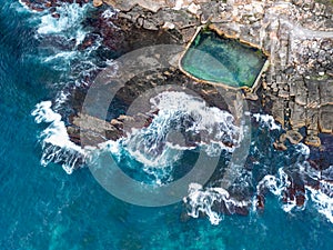 Incredible tidal pool built into the rocky cliffs of the coastline