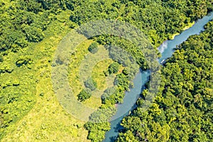 Incredible tourist landscape with a blue river in jungle forests. Top view, drone photo. Vanuatu