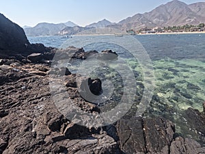 Incredible view from island to beach, small sandy beach on the island, coral reef, fujairah