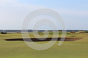 An incredible view of the most famous and historic classic links golf course, the Old Course in St. Andrews, Scotland