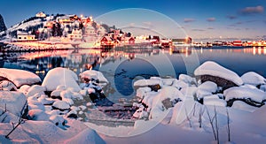 Incredible winter cityscape of Reine town, Norway, Europe.