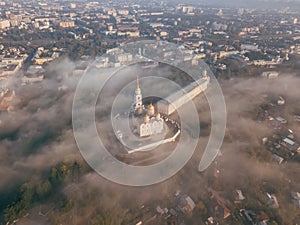 An incredibly beautiful misty morning over Vladimir. Aerial view on Assumption Cathedral in the fog. Russia. Vladimir