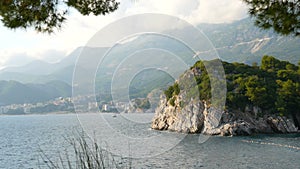 Incredibly beautiful pristine nature of Montenegro, rocky coastline, mountains and clear turquoise Mediterranean Sea