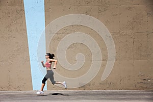 Incredibly fit woman out for a run,