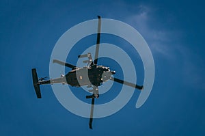 An increible helicopter flying above of you photo