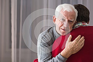 Incurable senior and his son photo