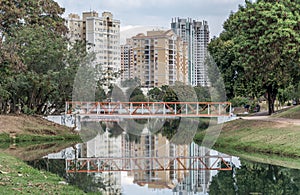 Small orange bridge in the Ecological Park, in Indaiatuba, Brazil photo