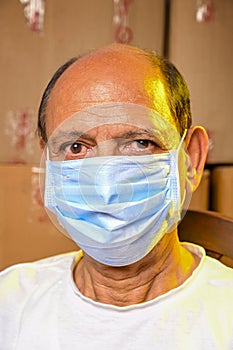 An Indain Senior citizen man with mask COVID time