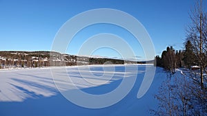 Indalsalven river from Undersaker town in winter in Jamtland in Sweden