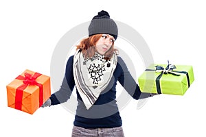 Indecisive woman holding gifts