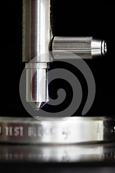 Indenter closeup with calibration block