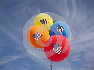 Independence Day Balloons against blue sky with US flags