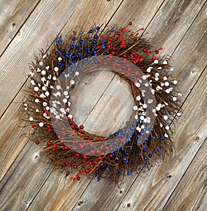Independence Day wreath on rustic wooden boards