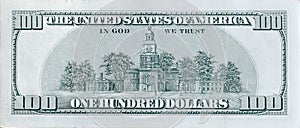 Independence Hall on 100 dollars banknote back side closeup macro fragment. United states hundred dollars money bill