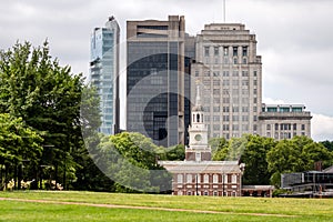Independence Hall north facade against the backdrop of a modern city, Philadelphia, Pennsylvania, USA