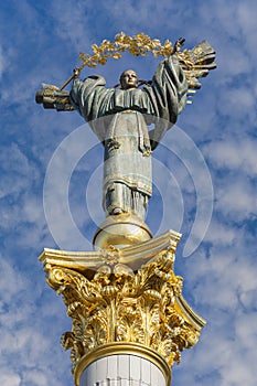 Independence monument on blue sky with clouds background in Kyiv, Ukraine