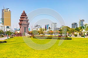 Independence Monument in Phnom Penh, Cambodia with a well manicured park in the foreground