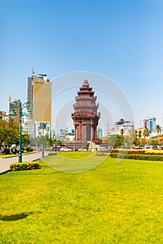 Independence Monument in Phnom Penh, Cambodia with a well manicured park in the foreground