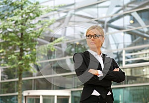 Independent business woman standing outdoors photo