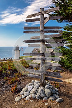 Index distance to capitals of the World and lighthouse, California photo