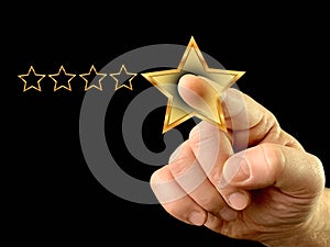 Index finger and five stars. Finger touch on the monitor. A man gives a high score with five stars. Concept: quality mark, level