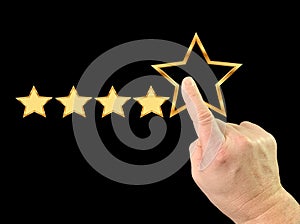 Index finger and five stars. Finger touch on the monitor. A man gives a high score with five stars. Concept: quality mark, level