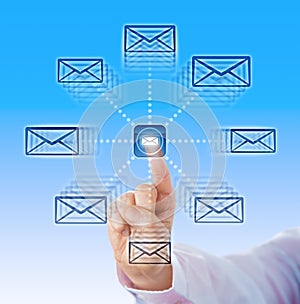 Index Finger Sending Email Icons Into Cyber Space