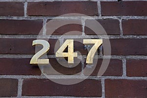 Index with the number 247 on the facade