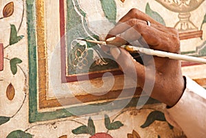 India, Amber fort: restauration of wall paints photo