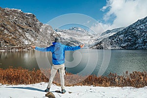 India - Boy and Mountain Lake in Sikkim