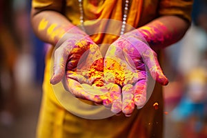 India Closeup of Hands of a Girl with colours during the celebration of Holi, festival celebration