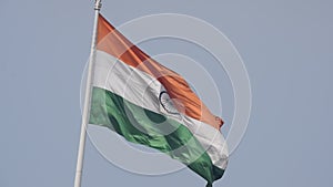 India flag flying high at Connaught Place with pride in blue sky, India flag fluttering, Indian Flag on Independence Day and