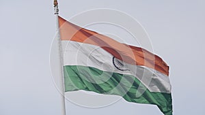 India flag flying high at Connaught Place with pride in blue sky, India flag fluttering, Indian Flag on Independence Day and